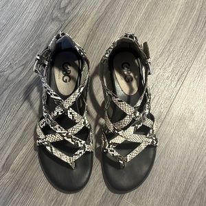 G by Guess womens snake print gladiator sandals. Size 6.5
